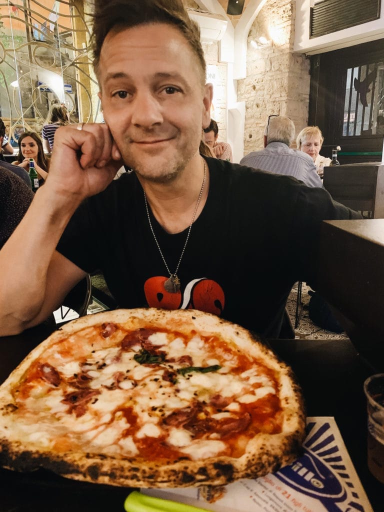 Stephen with a margherita pizza at Sorbillo in Naples, Italy